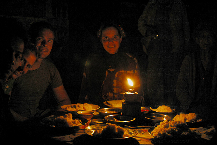 [Photograph: Dinner with the Village Headman]